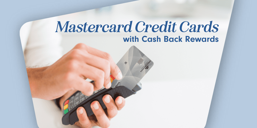 A hand swiping a credit card in a hand-held credit card machine.