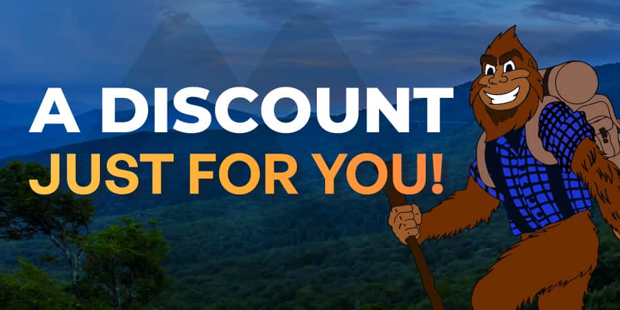 Marv hiking against a backdrop of the Blue Ridge Mountains. Across the center, the words: a discount just for you!