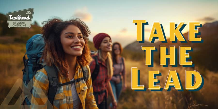 A group of young smiling females hiking. The words at the right: take the lead.
